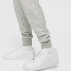 Tech Fleece joggingbroek heren dark grey heather  black*Nike